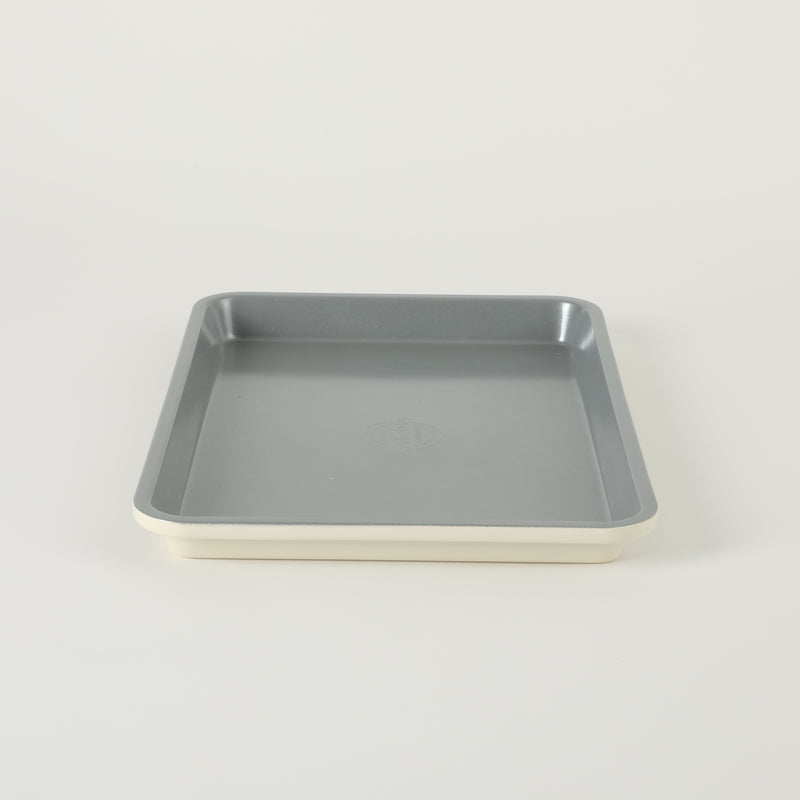 Sur la Table Kitchen Essentials Bake Sale 13" Carbon Steel Cookie Sheet - Eggshell - Grey Nonstick Interior - Color Label