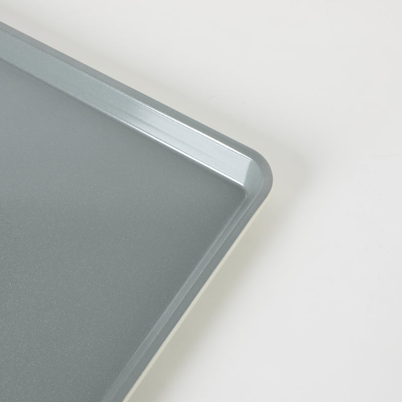 Sur la Table Kitchen Essentials Bake Sale 18" Carbon Steel Cookie Sheet - Eggshell - Grey Nonstick Interior - Color Label