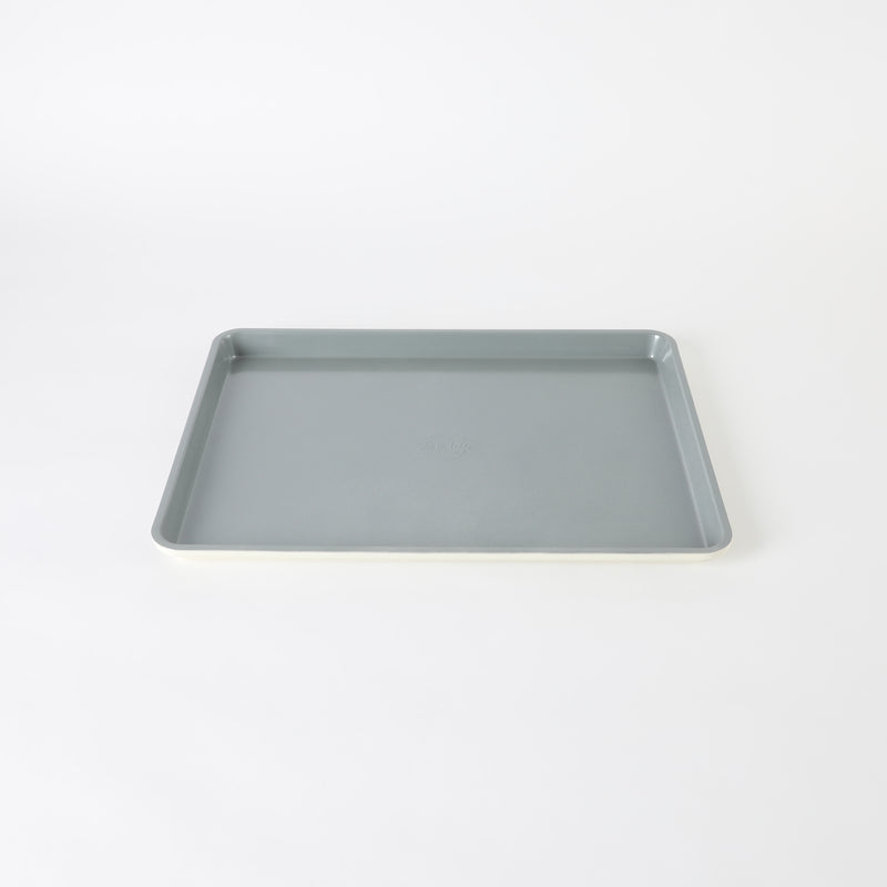 Sur la Table Kitchen Essentials Bake Sale 18" Carbon Steel Cookie Sheet - Eggshell - Grey Nonstick Interior - Color Label