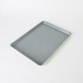Sur la Table Kitchen Essentials Bake Sale 18" Carbon Steel Cookie Sheet - Eggshell - Grey Nonstick Interior - Color Label