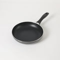Oster Clairborne 9.5" Aluminum Frying Pan - Charcoal Grey - Nonstick - Hammered Exterior - Color Coating - Bakelite Handle - Color Sleeve